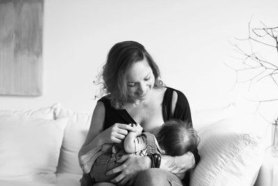 A moment of complicity between a parent and their baby