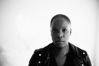 A portrait of a serious looking person