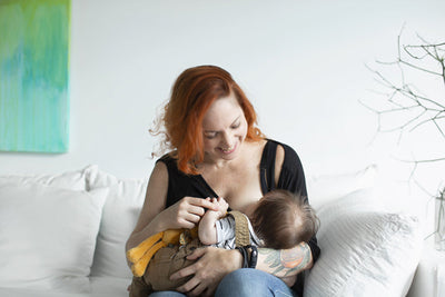 A moment of complicity between a parent and their baby